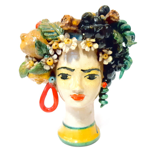Cabeza siciliana de mujer con flores y limones