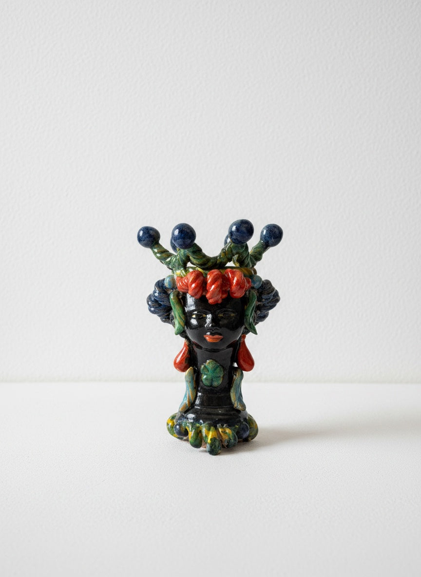 Pareja de Cabezas Ornamentales