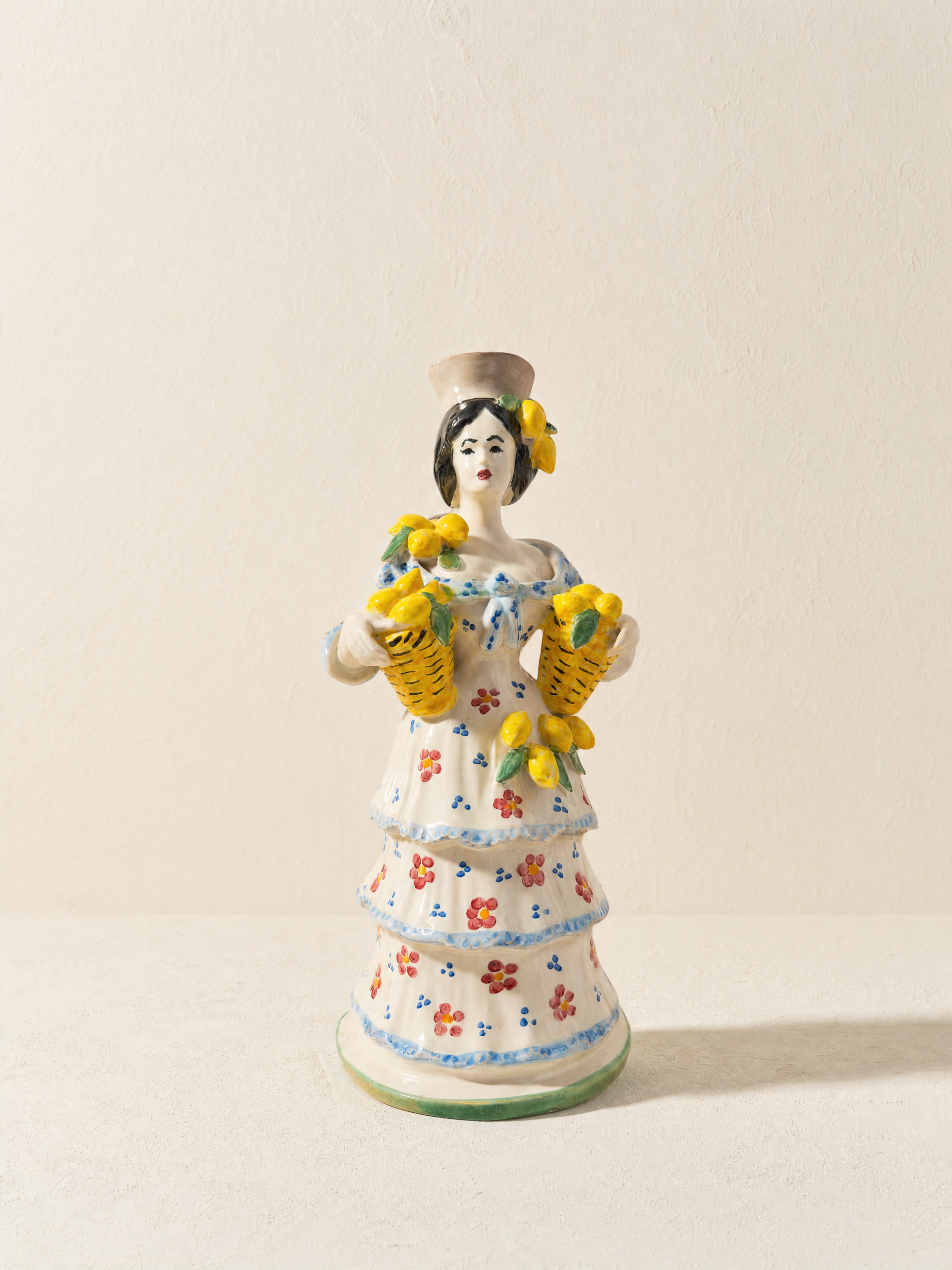 Candelabro Mujer con limones
