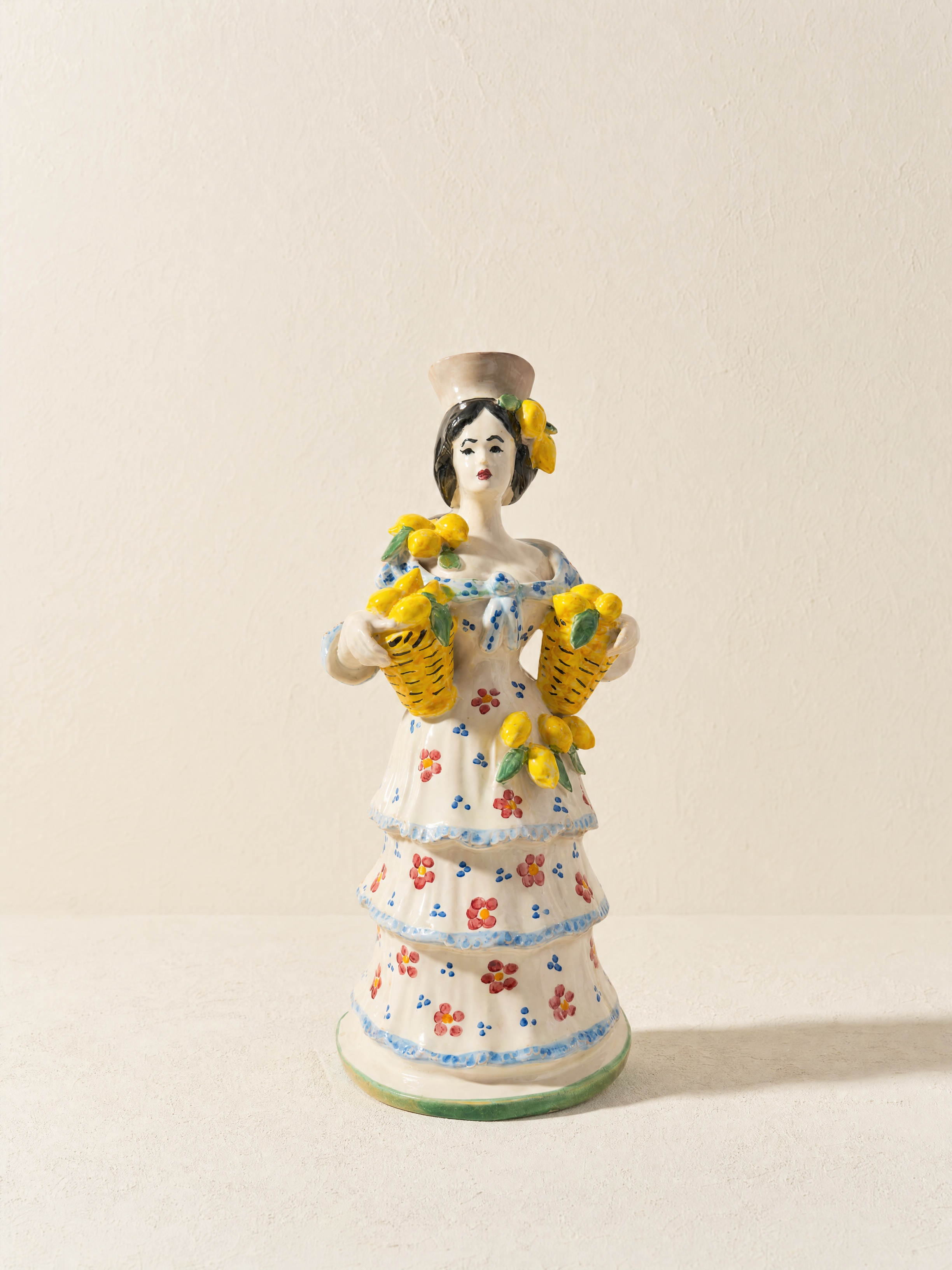 Candelabro Mujer con limones