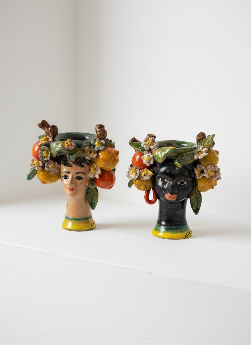 Pareja de Cabezas con Cítricos