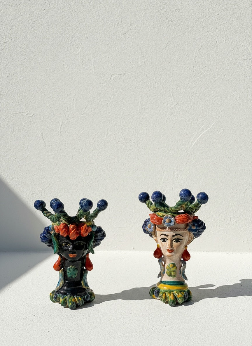 Pareja de Cabezas Ornamentales