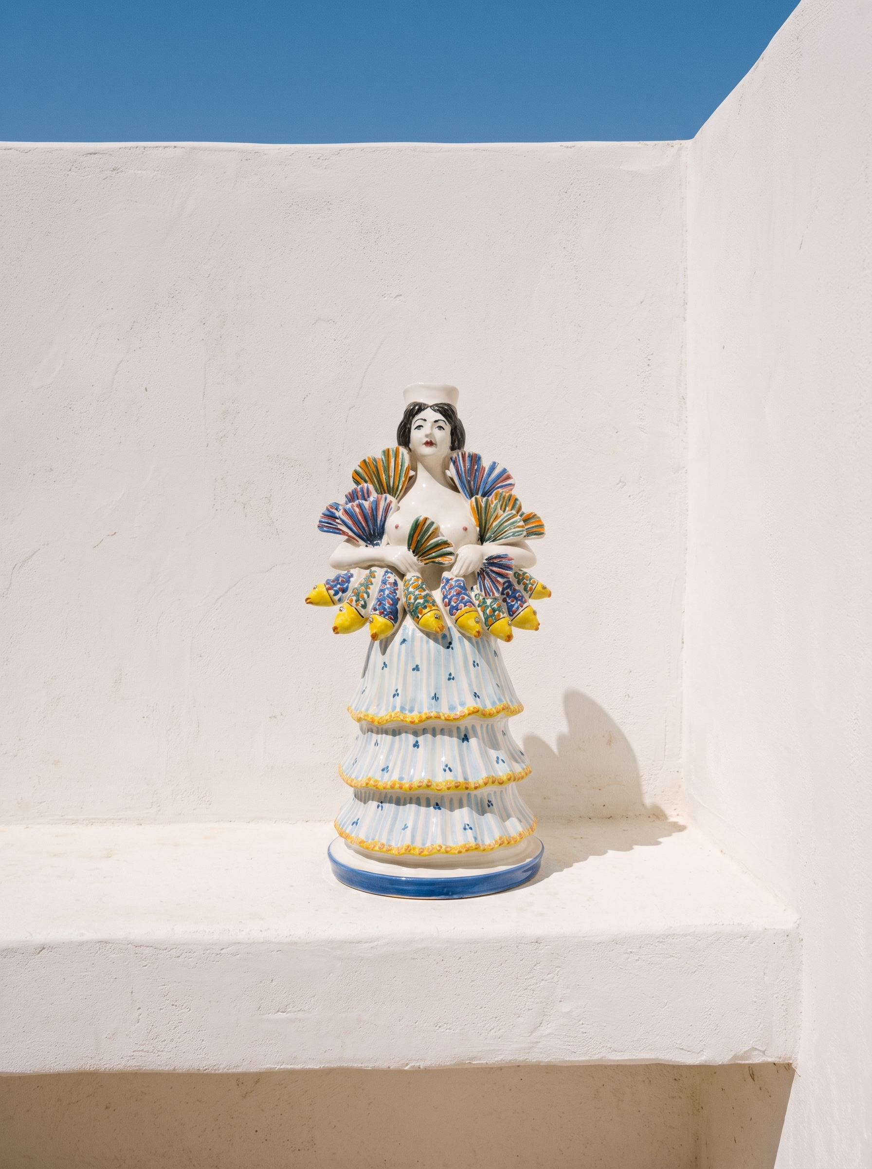 Candelabro Mujer con peces