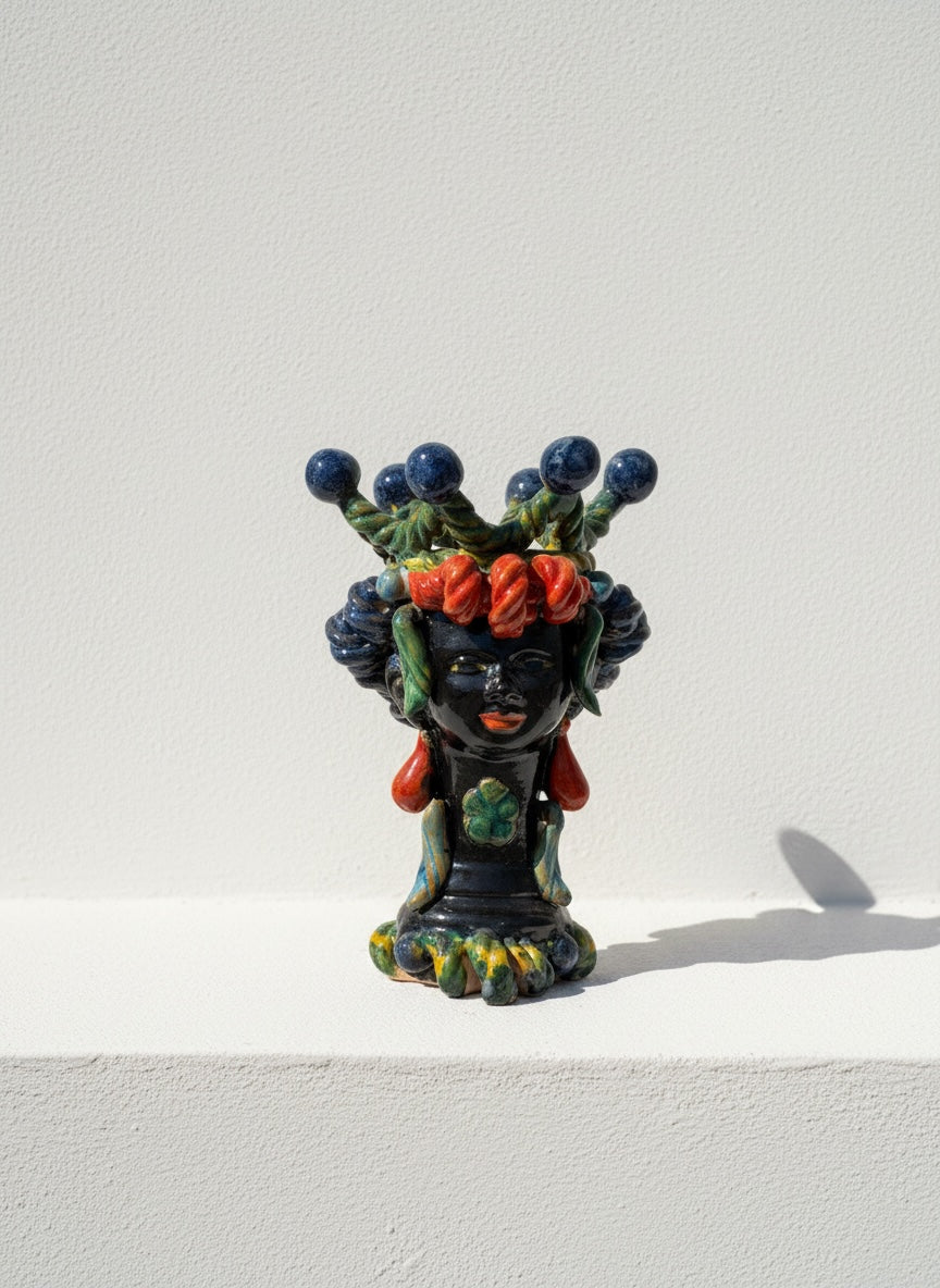 Pareja de Cabezas Ornamentales