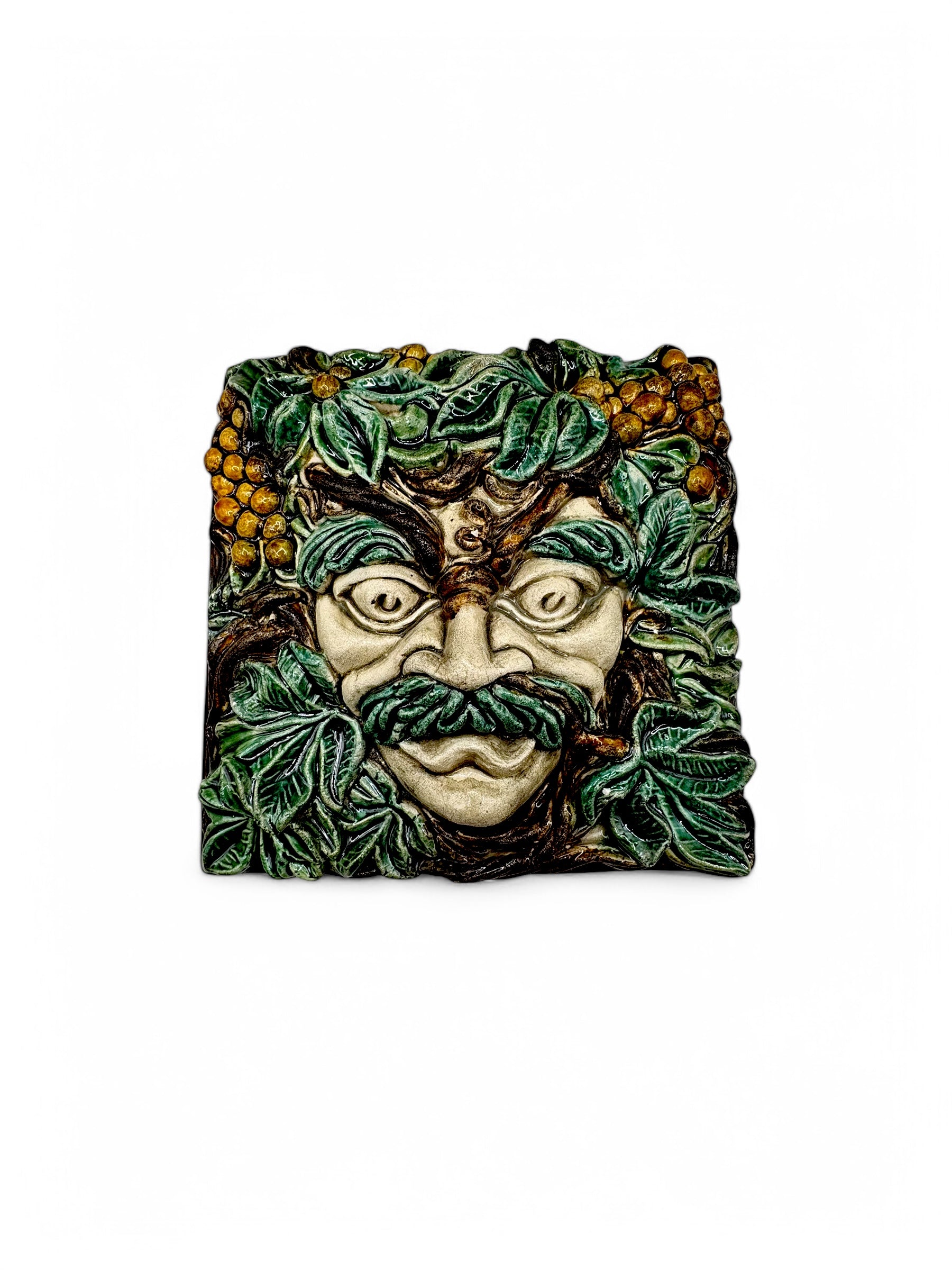 Azulejo artesanal en relieve Baco