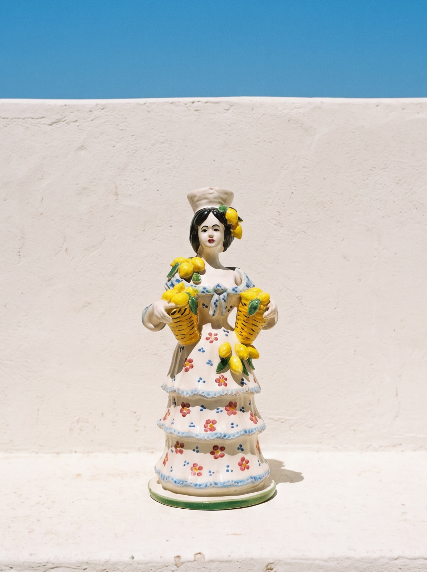 Candelabro Mujer con limones