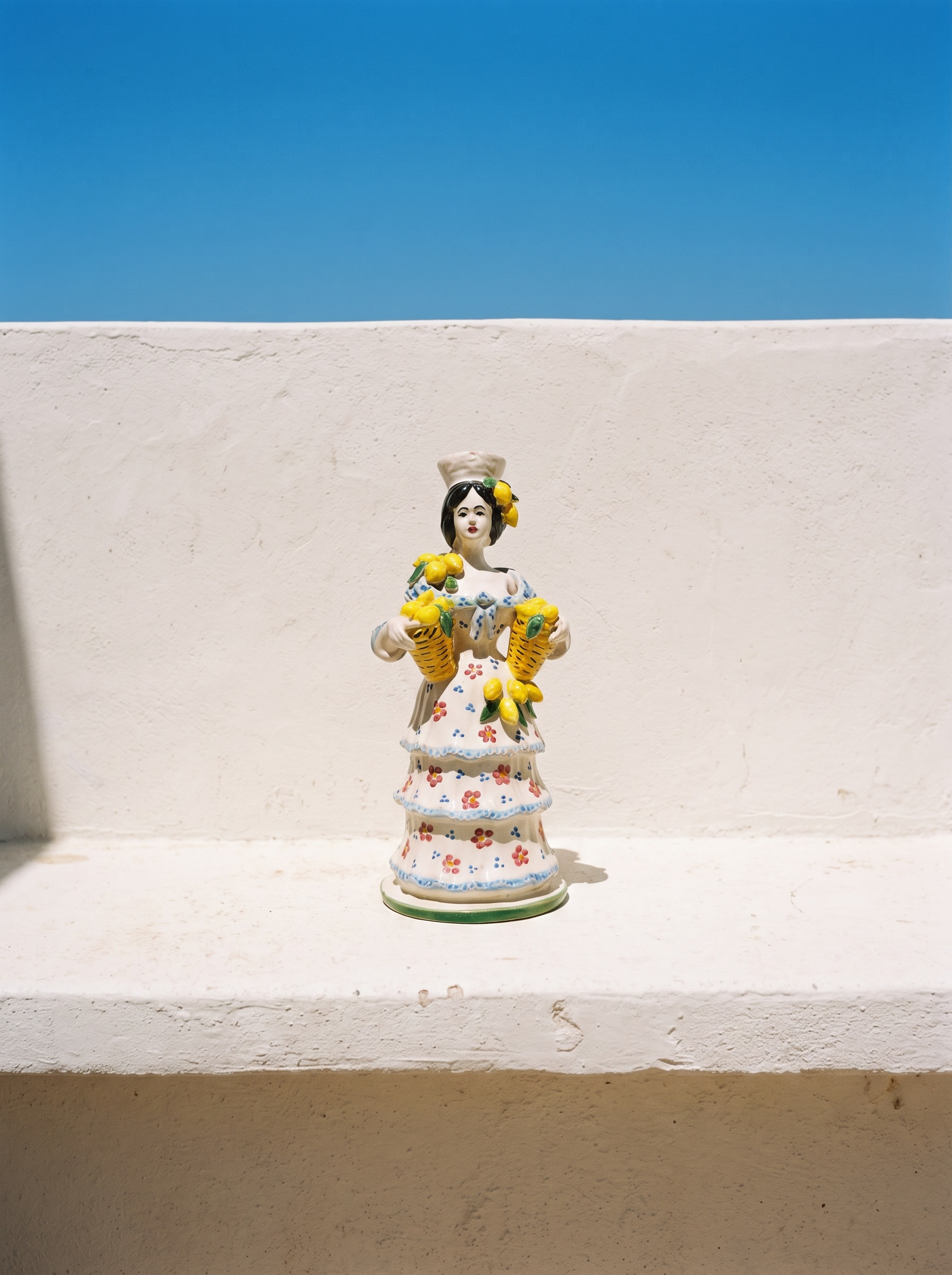 Candelabro Mujer con limones