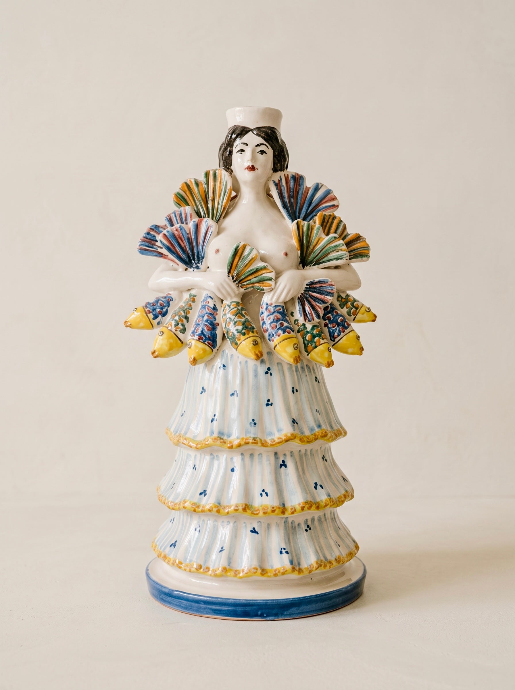 Candelabro Mujer con peces