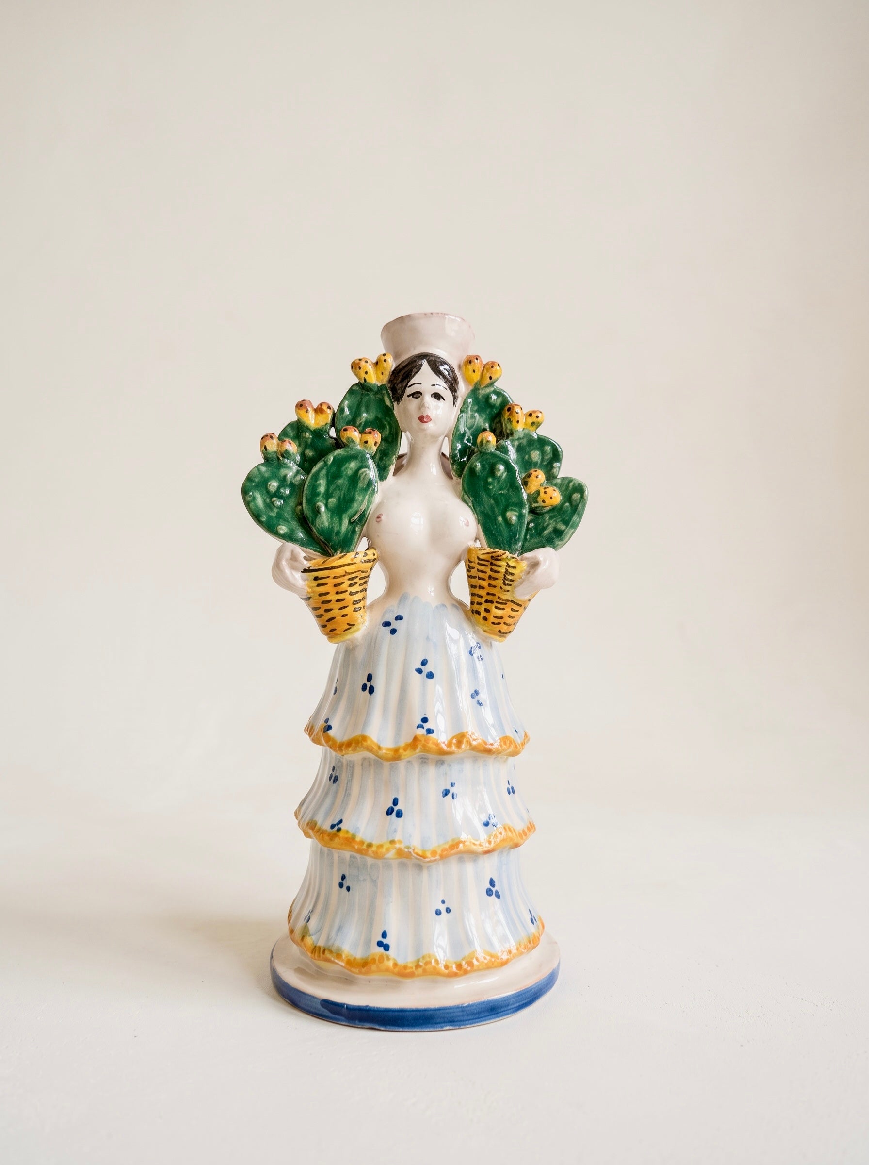 Candelabro Mujer con cactus