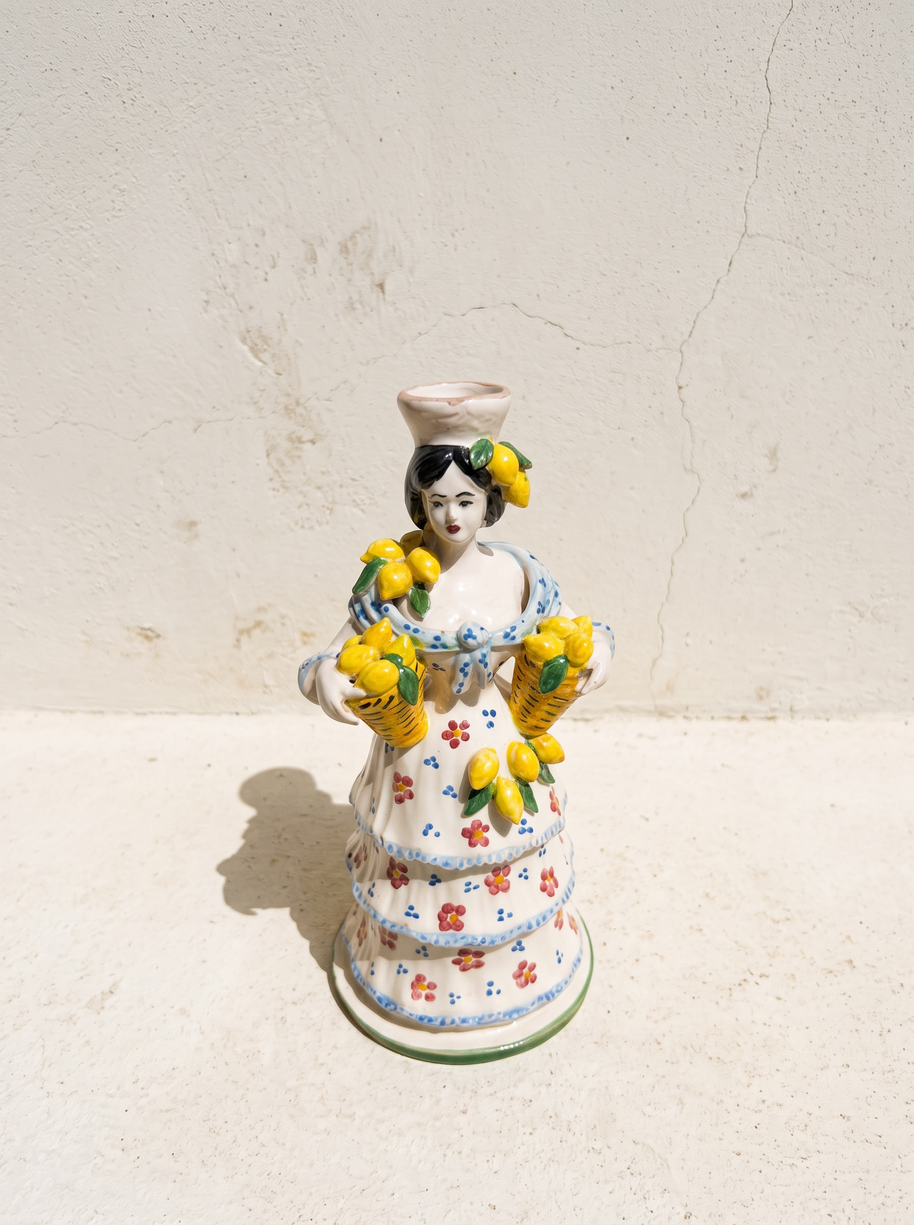 Candelabro Mujer con limones