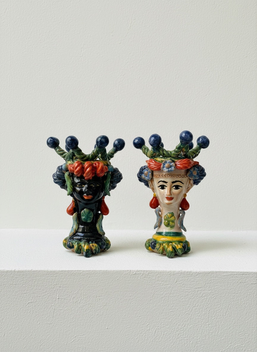 Pareja de Cabezas Ornamentales
