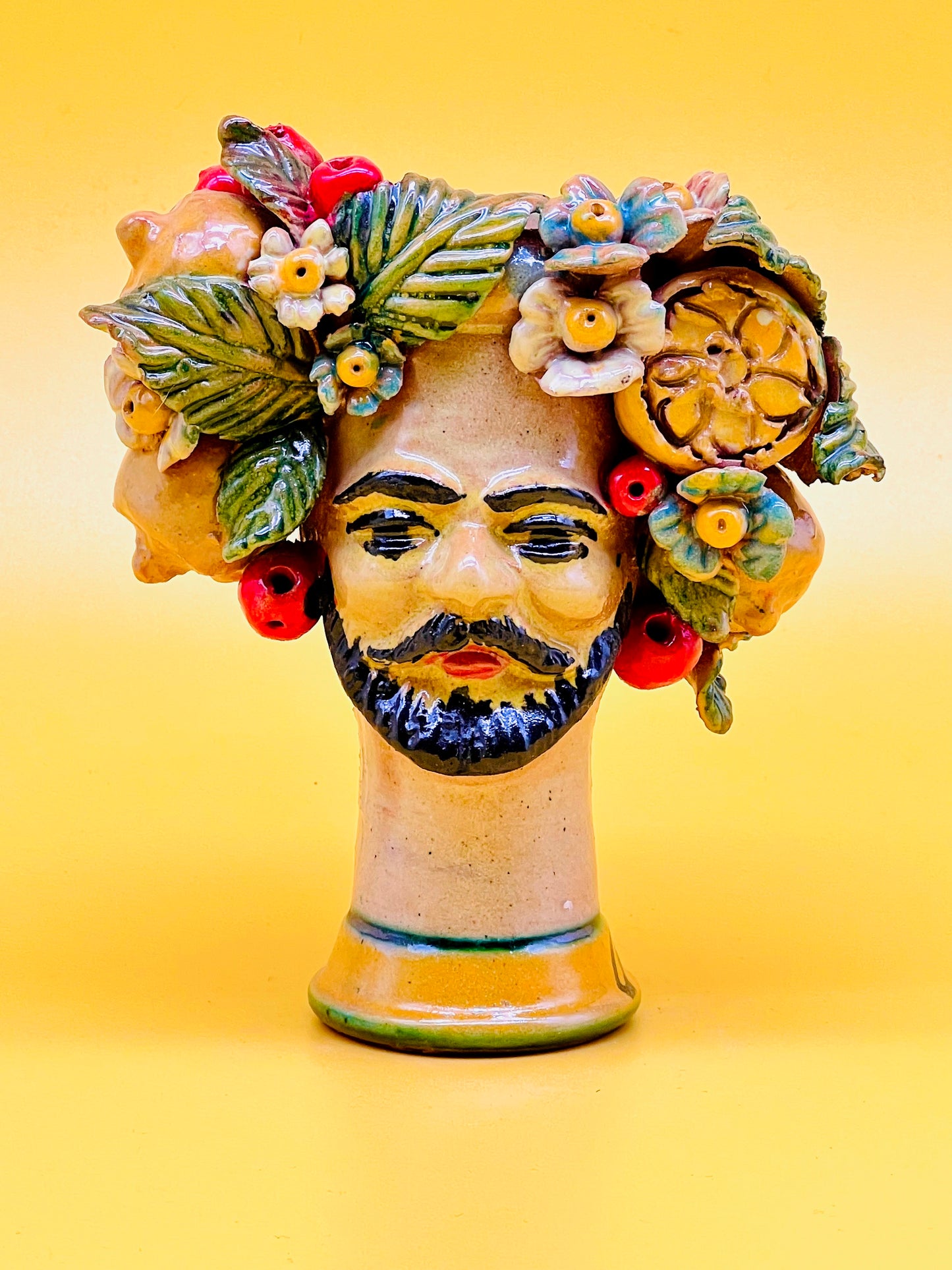 Cabeza de hombre decorada con limones y flores Gemelo02