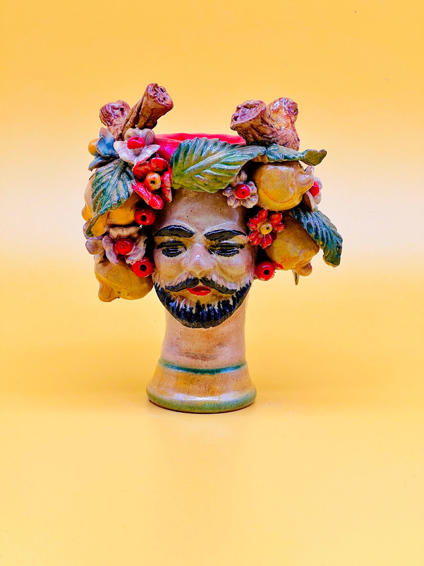 Cabeza de hombre decorada con limones y flores Gemelo01
