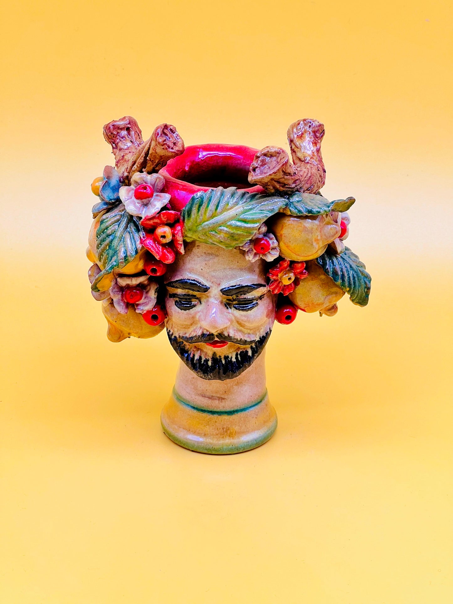 Cabeza de hombre decorada con limones y flores Gemelo01
