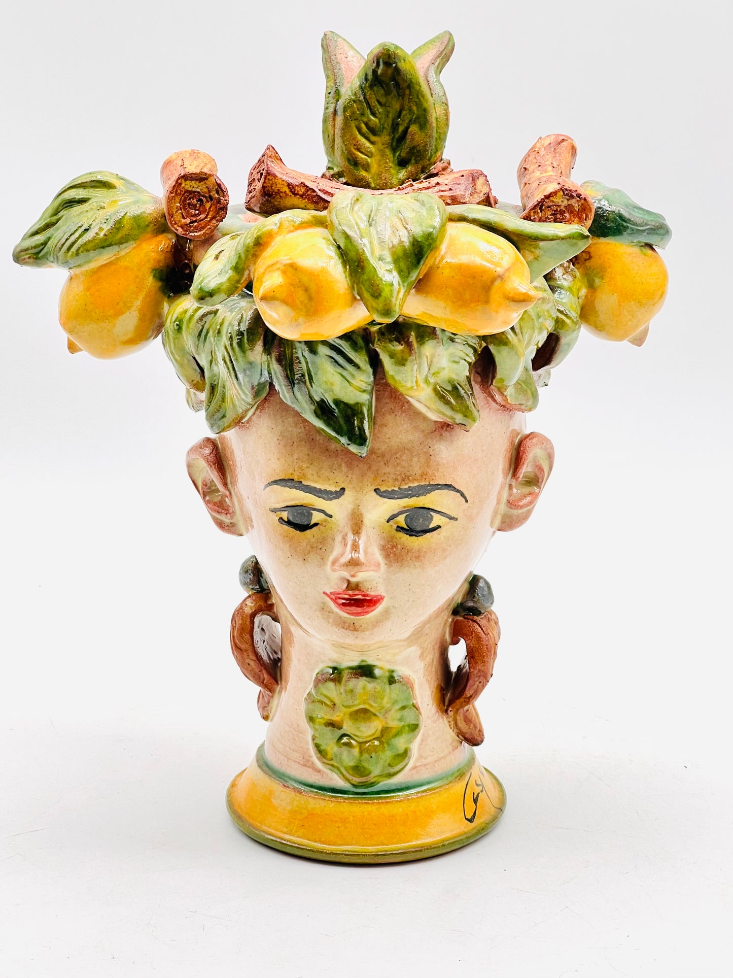 Cabeza de mujer decorada con limones 23cm