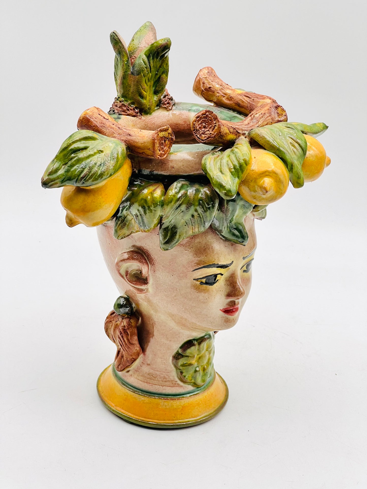 Cabeza de mujer decorada con limones 23cm